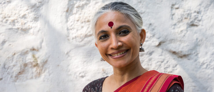 a woman smiling at the camera